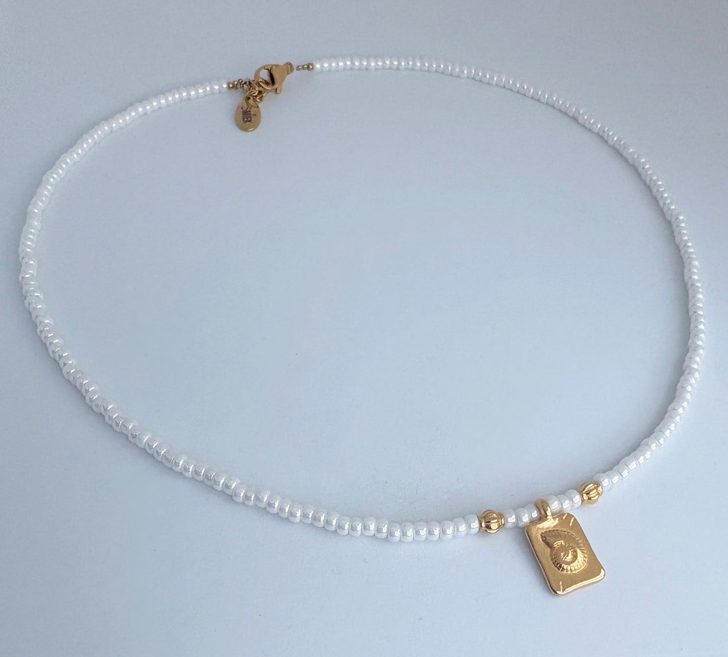 White miyuki gold Shell