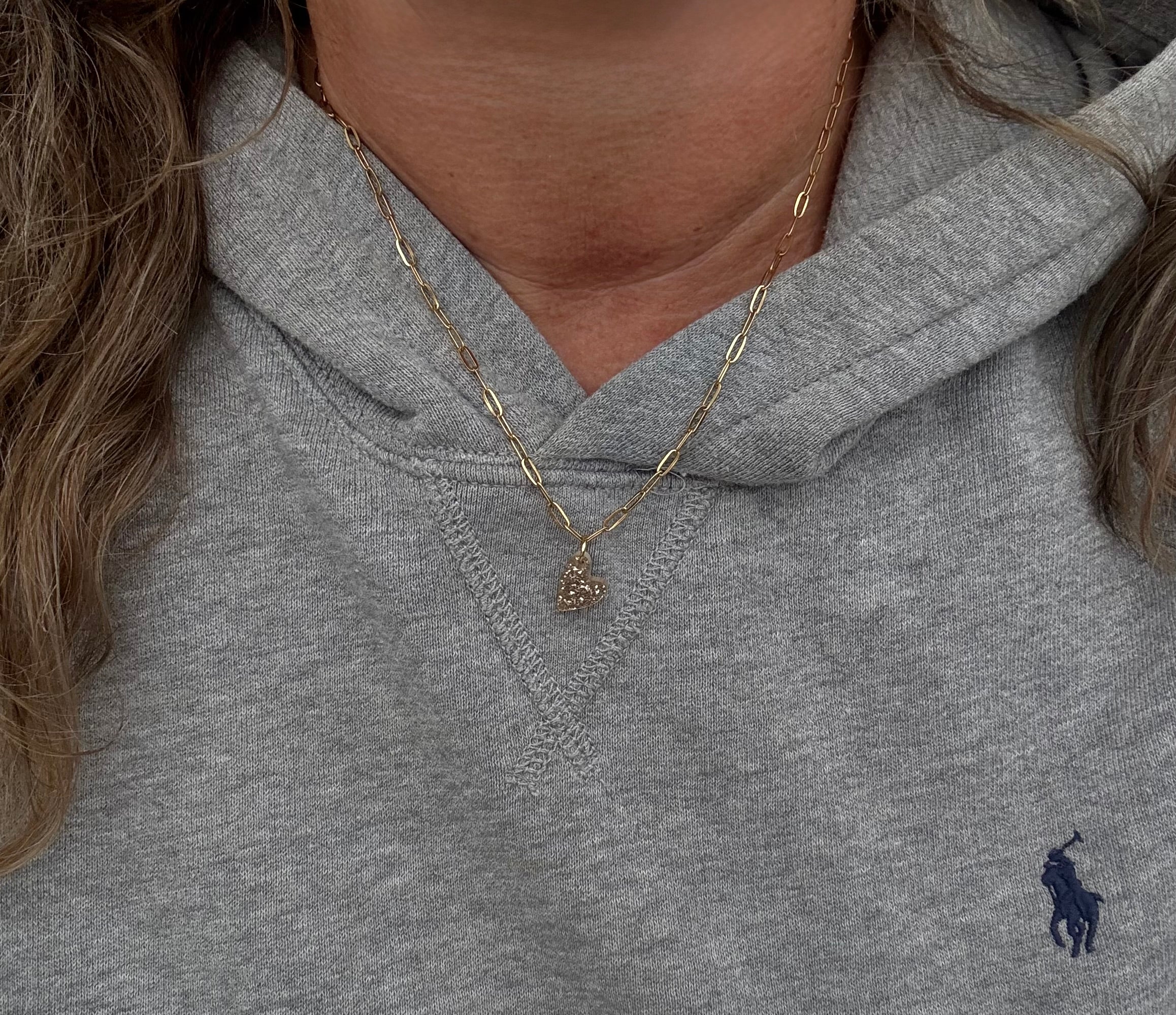 Stainless steel gouden ketting met glitterhart.